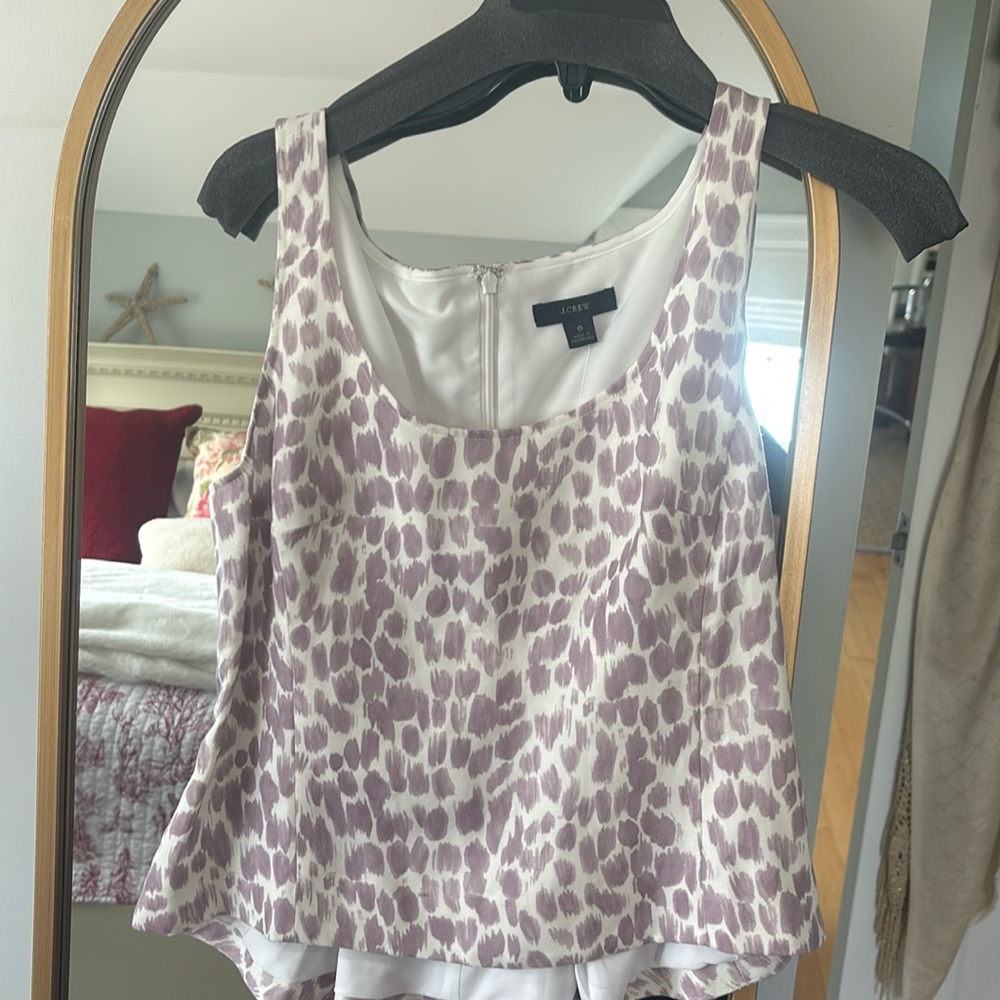Really adorable J Crew white and lavender peplum top.  Size 6 Never worn.